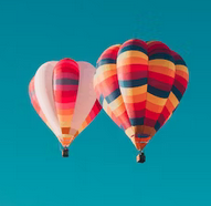 hot air balloons up in the sky